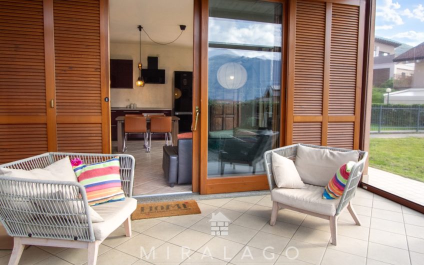COLICO Trilocale con giardino, taverna e box