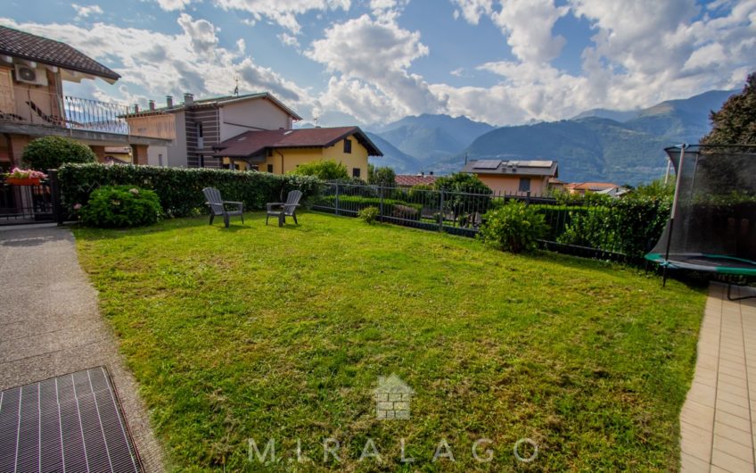 COLICO Trilocale con giardino, taverna e box