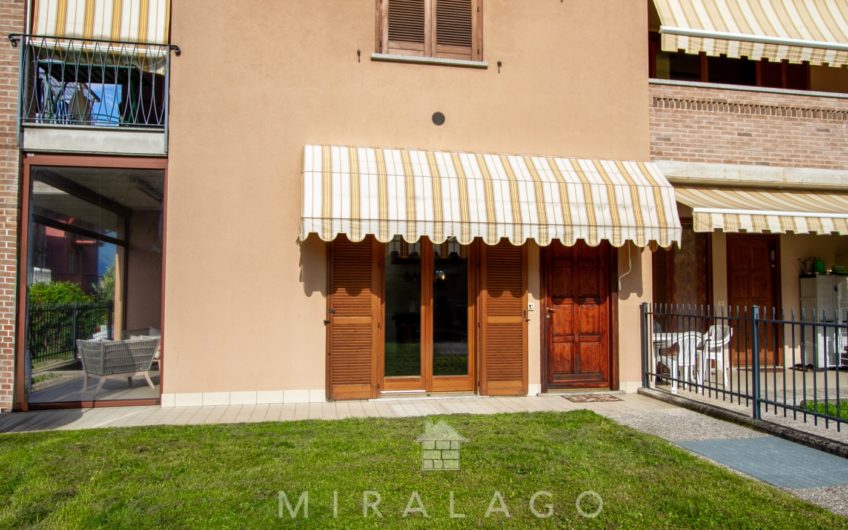 COLICO Trilocale con giardino, taverna e box