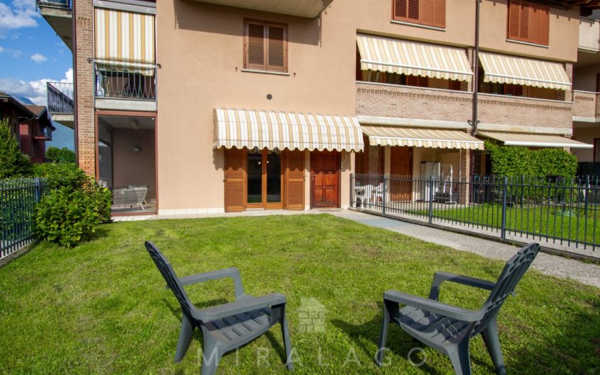 COLICO Trilocale con giardino, taverna e box