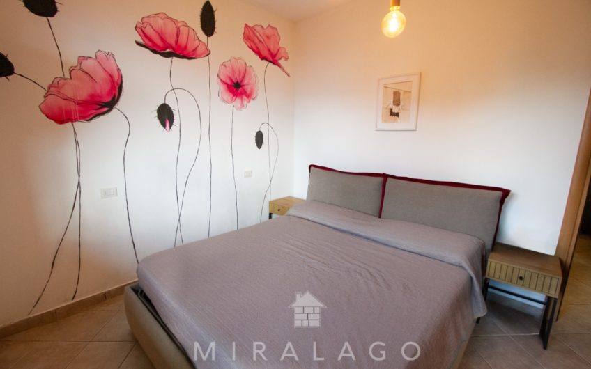 COLICO Trilocale con giardino, taverna e box
