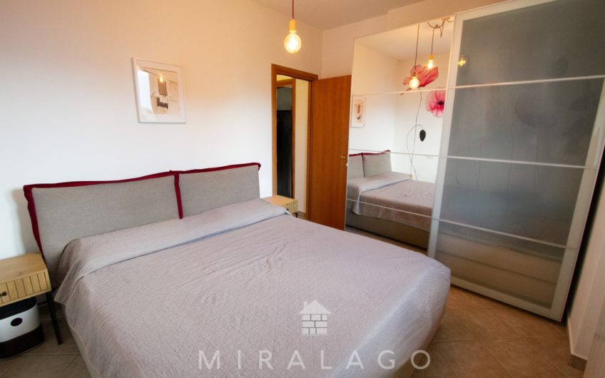 COLICO Trilocale con giardino, taverna e box