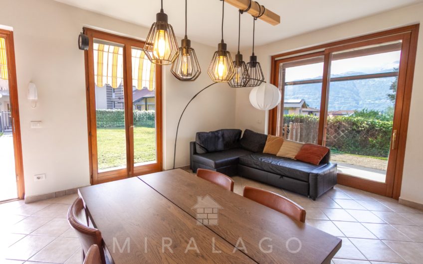 COLICO Trilocale con giardino, taverna e box